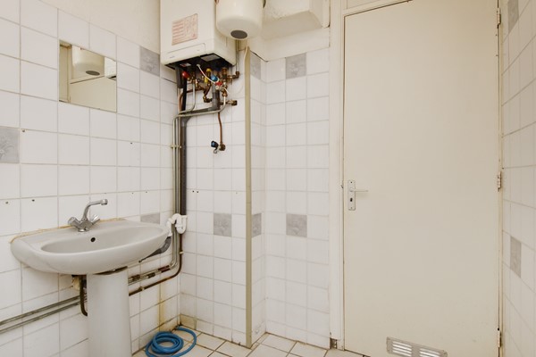 Medium property photo - Bragastraat 64, 2523 HJ Den Haag